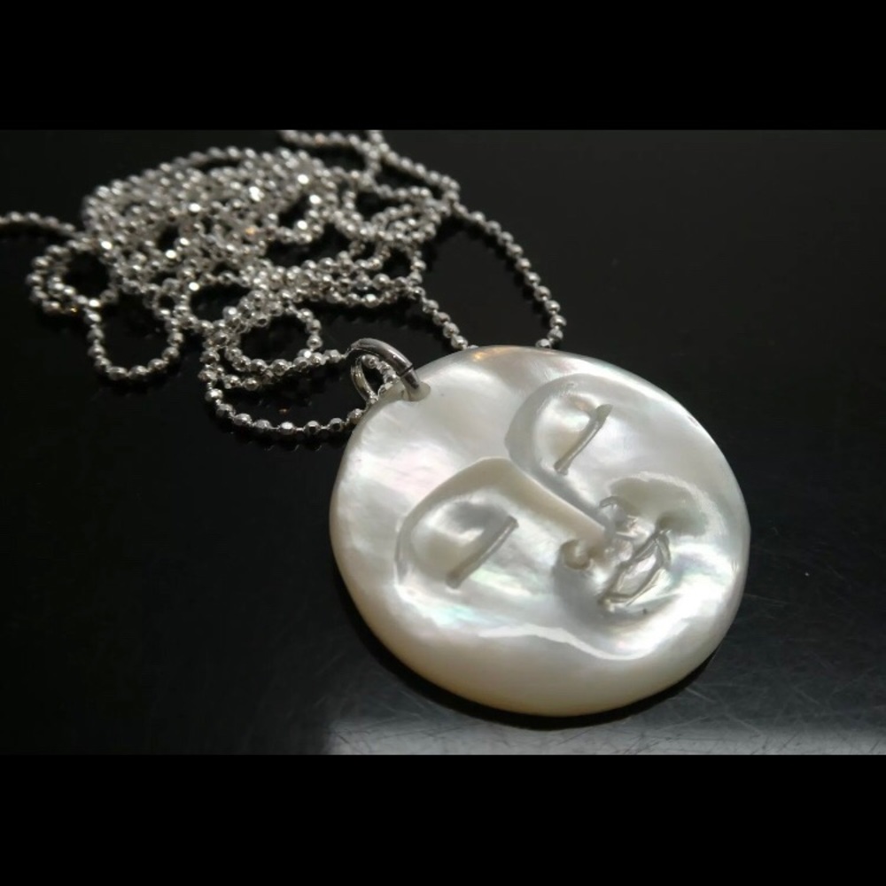 Carved MOP Moon Face Pendant